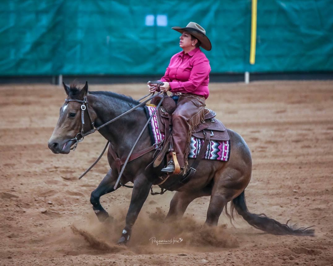 Woman Riding Horse